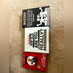 Set of 3 box set card games.